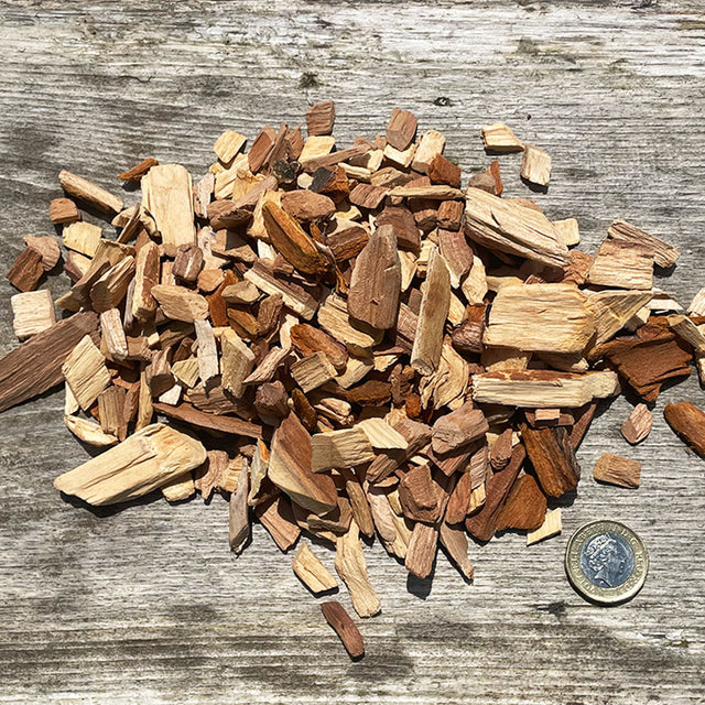 HotSmoked Plum Bulk Wood Chips on wooden board