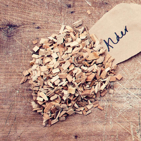 HotSmoked Alder Bulk Wood Chips sample on wood