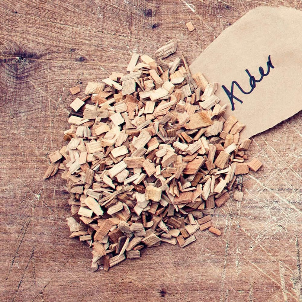 HotSmoked Alder Bulk Wood Chips sample on wood