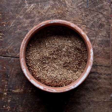 Oak Bulk Wood Dust sample in bowl on wood