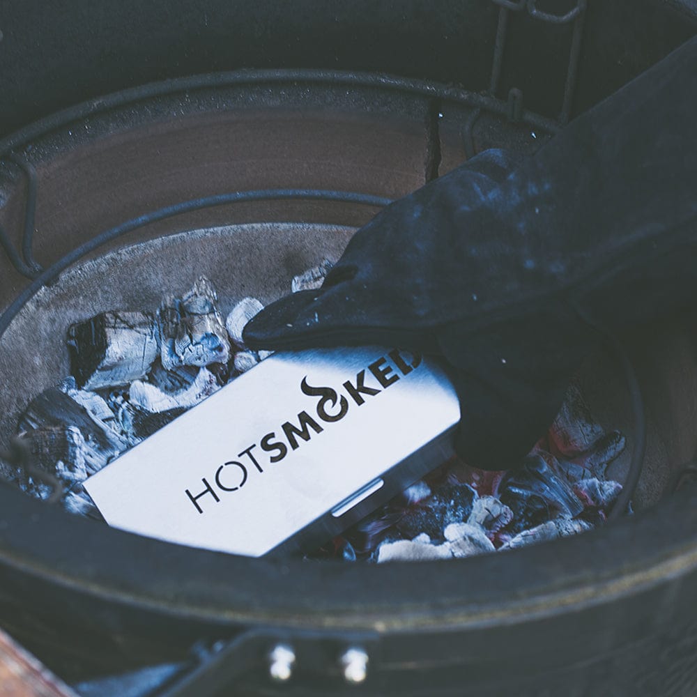 Hot Smoke in a Box man taking box from fire