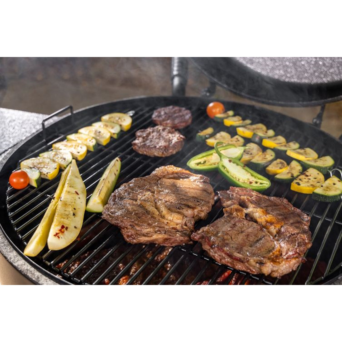 Pit Boss Grills Champion Barrel grilling meat and vegetables