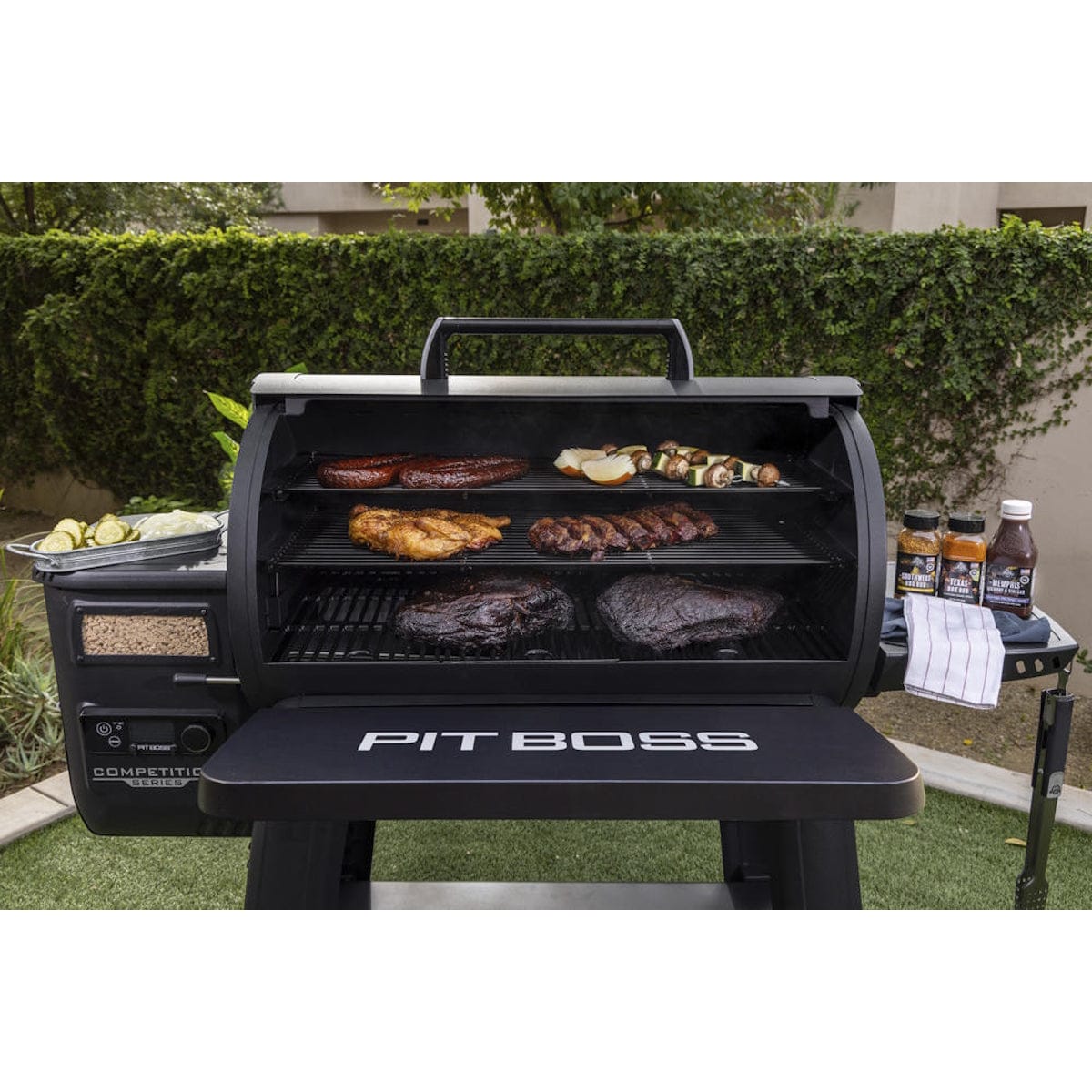 Pit Boss Grills Competition Series 1600 grilling meat
