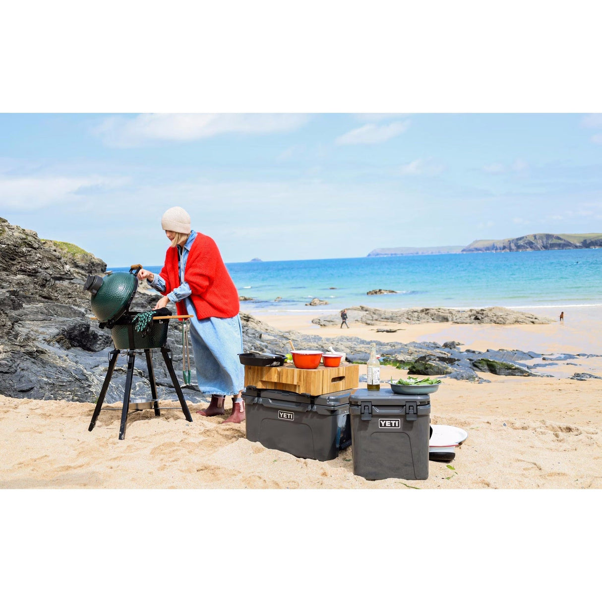 Big Green Egg MiniMax Bundle woman cooking on beach