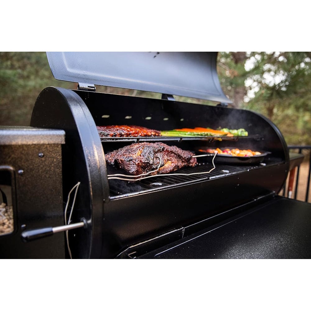 grilling food on Pit Boss 1150G Navigator Series Grill close up view