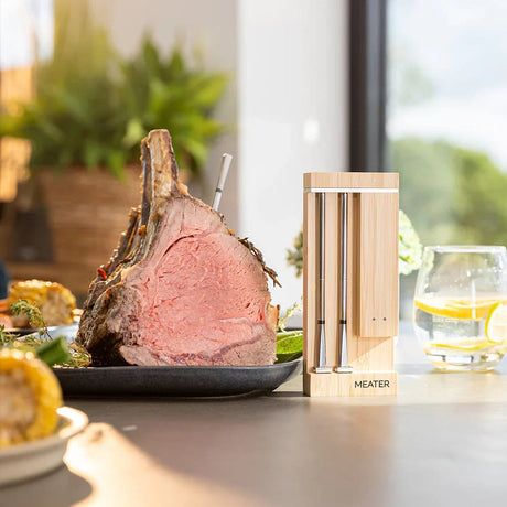 MEATER Pro Duo WiFi Thermometer next to steak