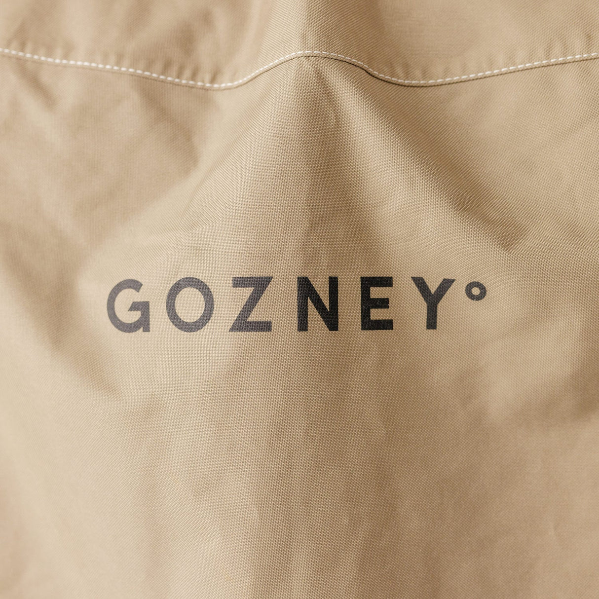 Dome Gen 2 Premium Outdoor Oven Cover close up of logo