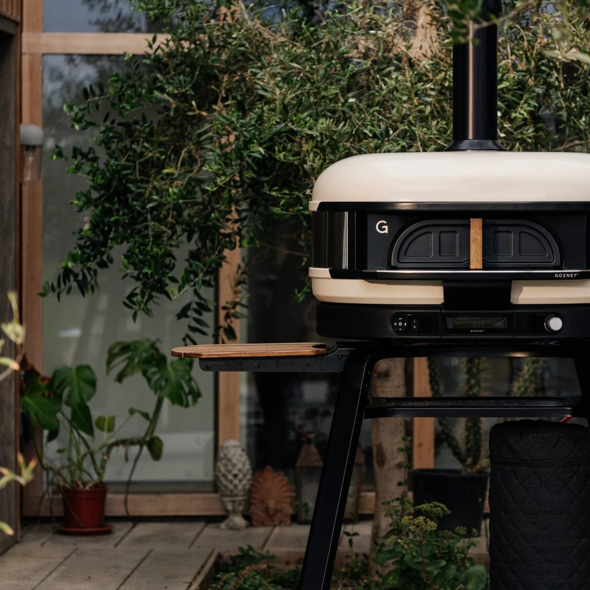 Dome Gen 2 Series Door white oven in backyard