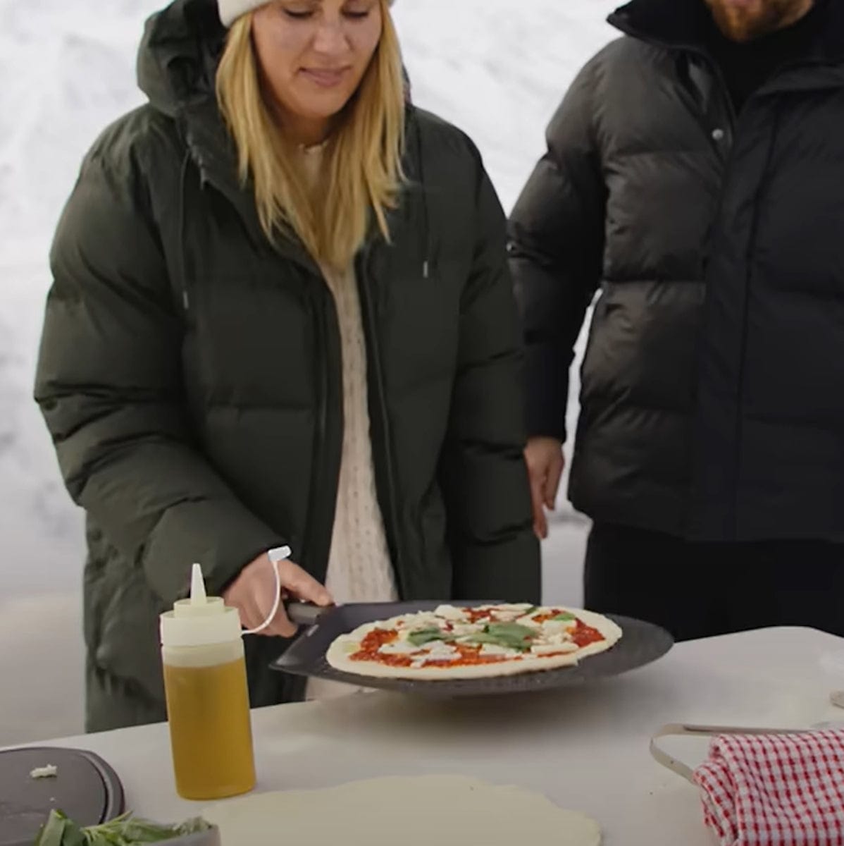woman preparing pizza on Venture Placement Peel