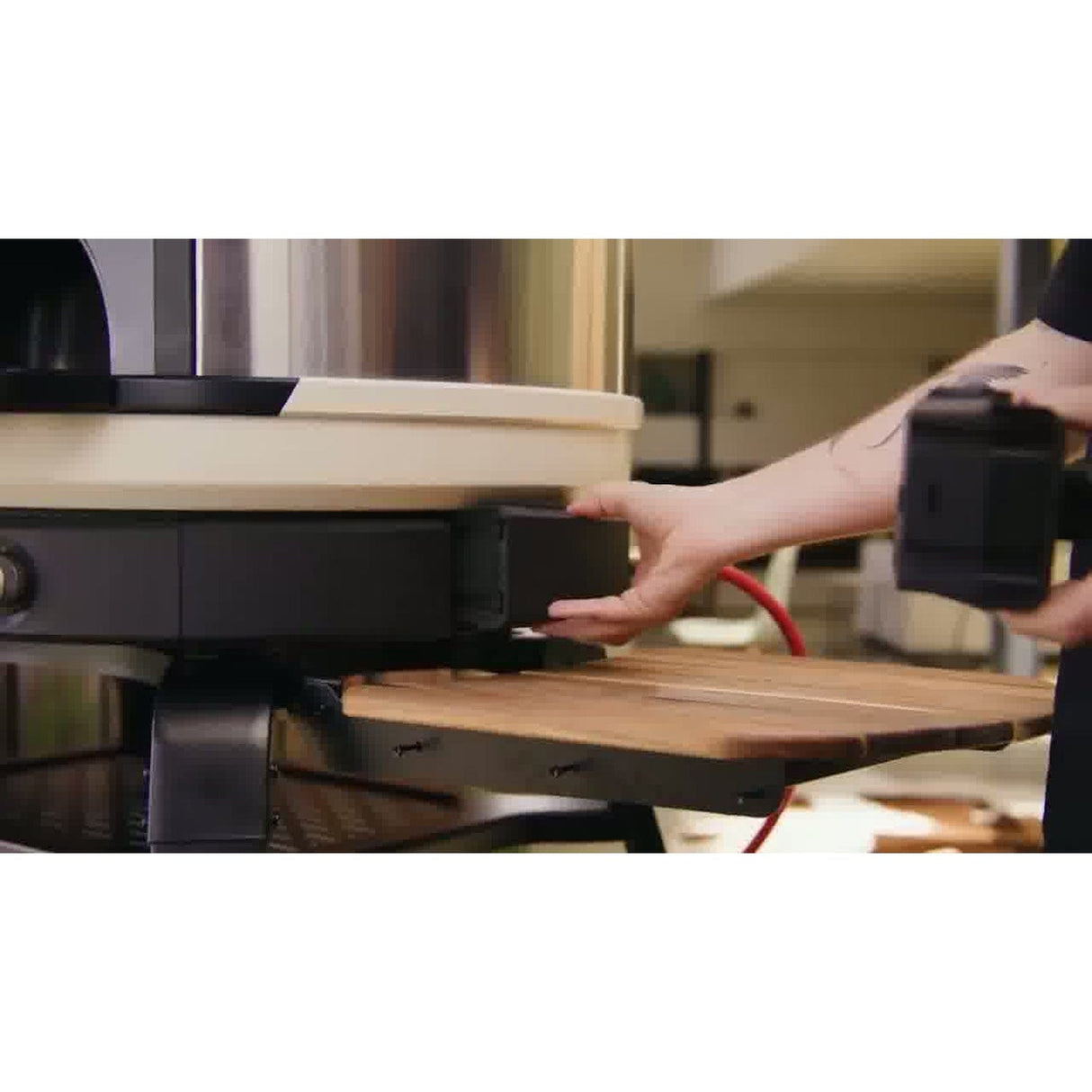 Wood-Fire Control Kit man pulling kit out