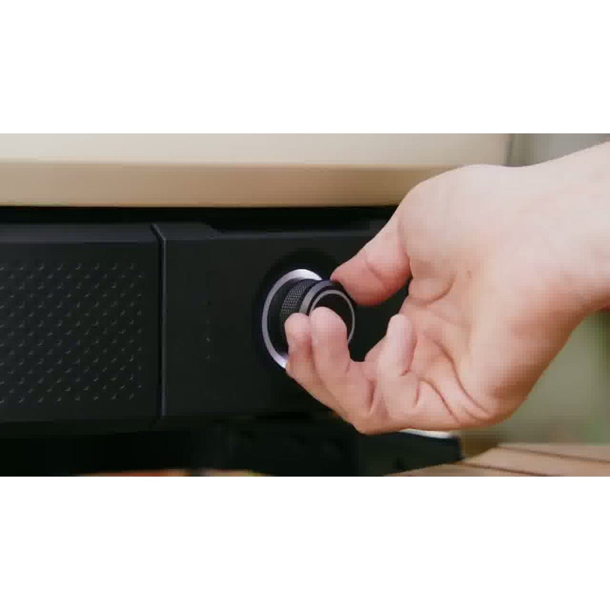 Wood-Fire Control Kit man turning up the heat