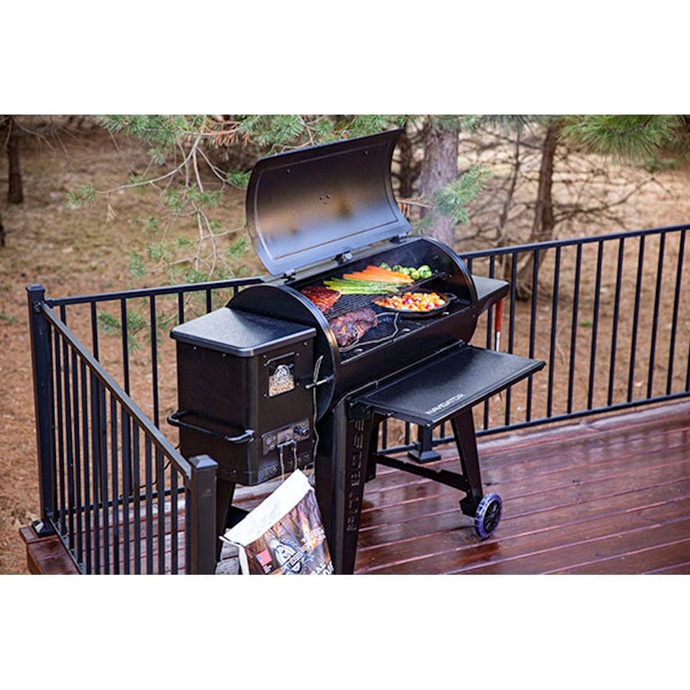 grilling food on Pit Boss 1150G Navigator Series Grill side view