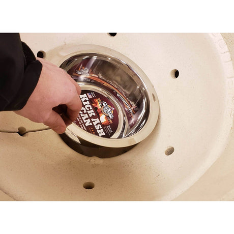 Kick Ash Can for Kamado Joe Classic hand putting can in kamado