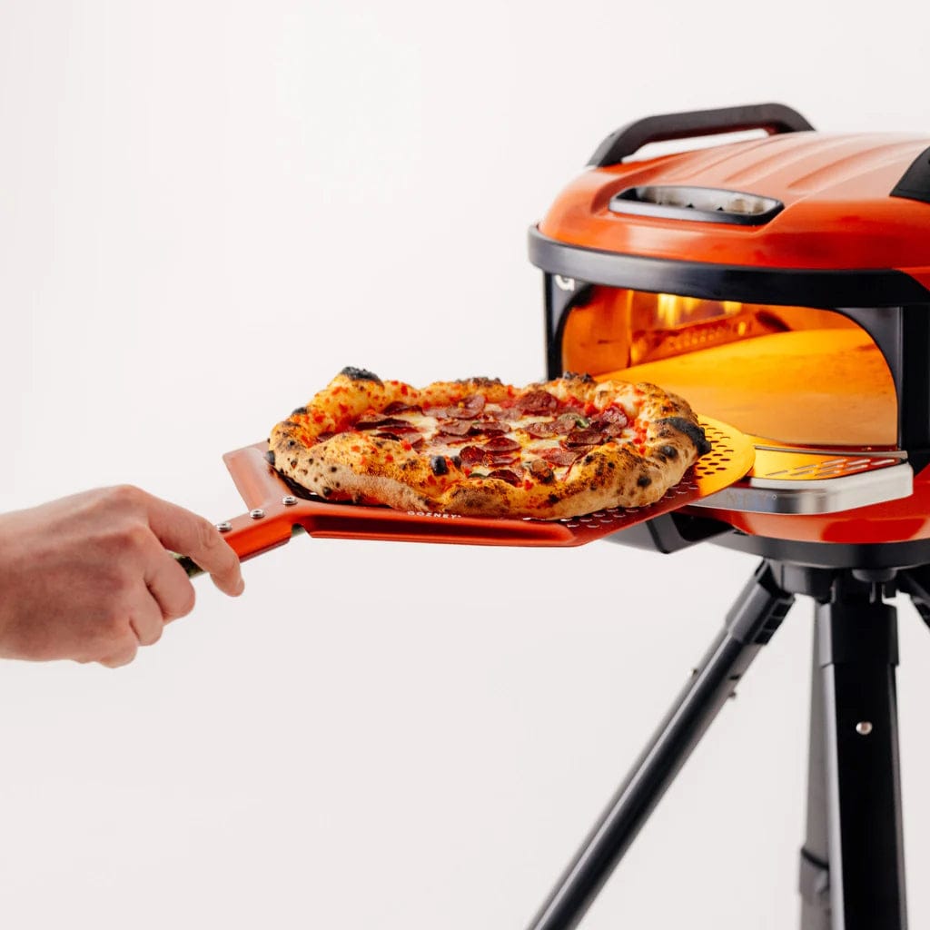 Gozney x Matty Matheson Venture Placement Peel pulling pizza out of the oven