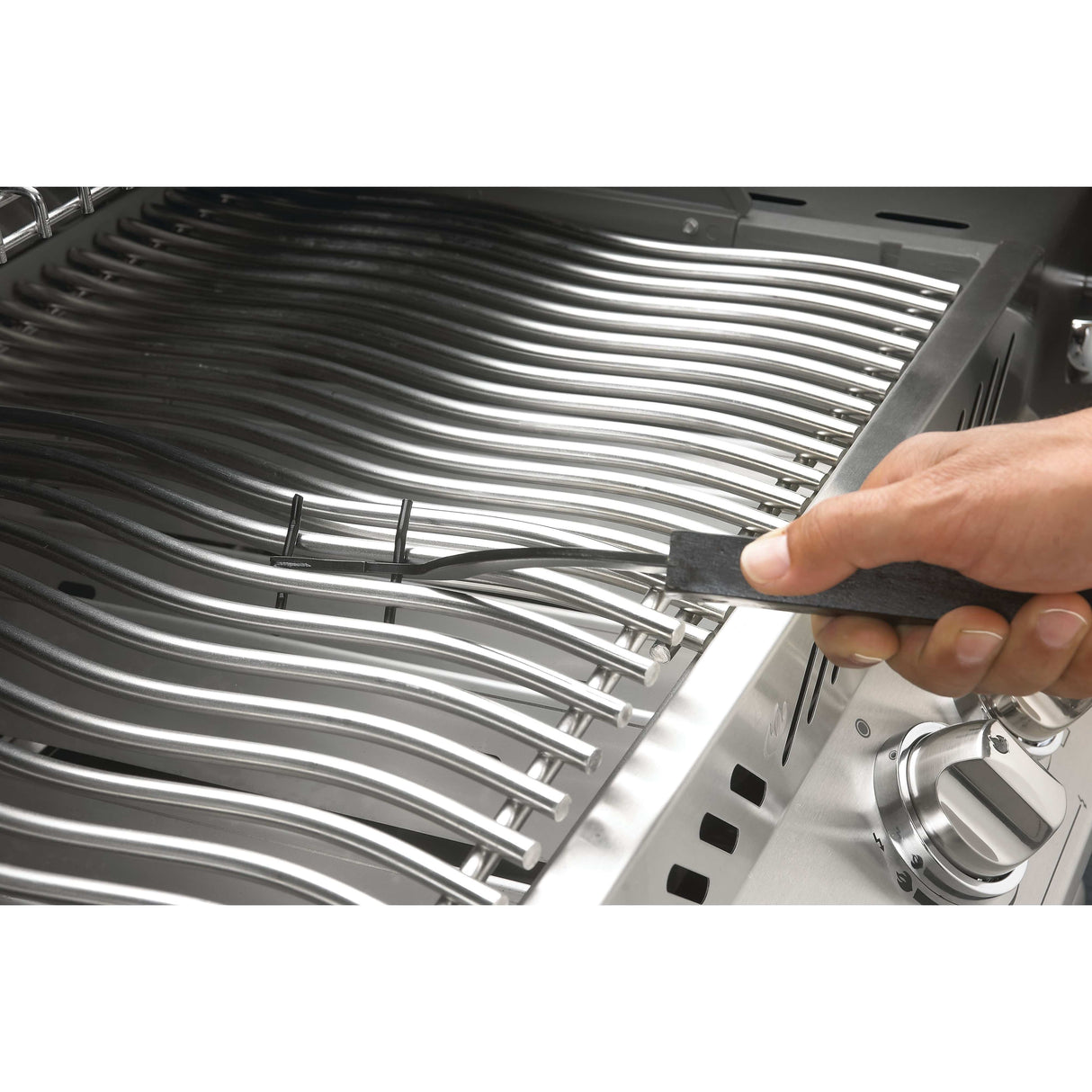 Grid Lifter with Hardwood Handle man lifting griddle