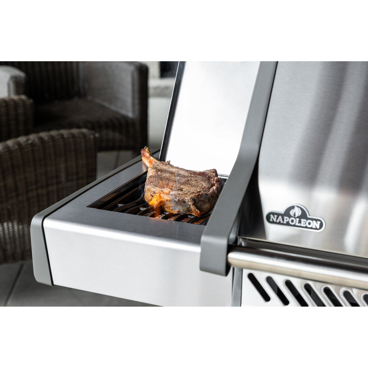 Napoleon Rogue XT 425 SIB steak on stainless steel side burner