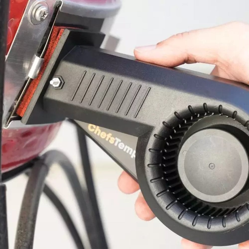 Breezo V2 BBQ Temperature Control Fan hand using fan