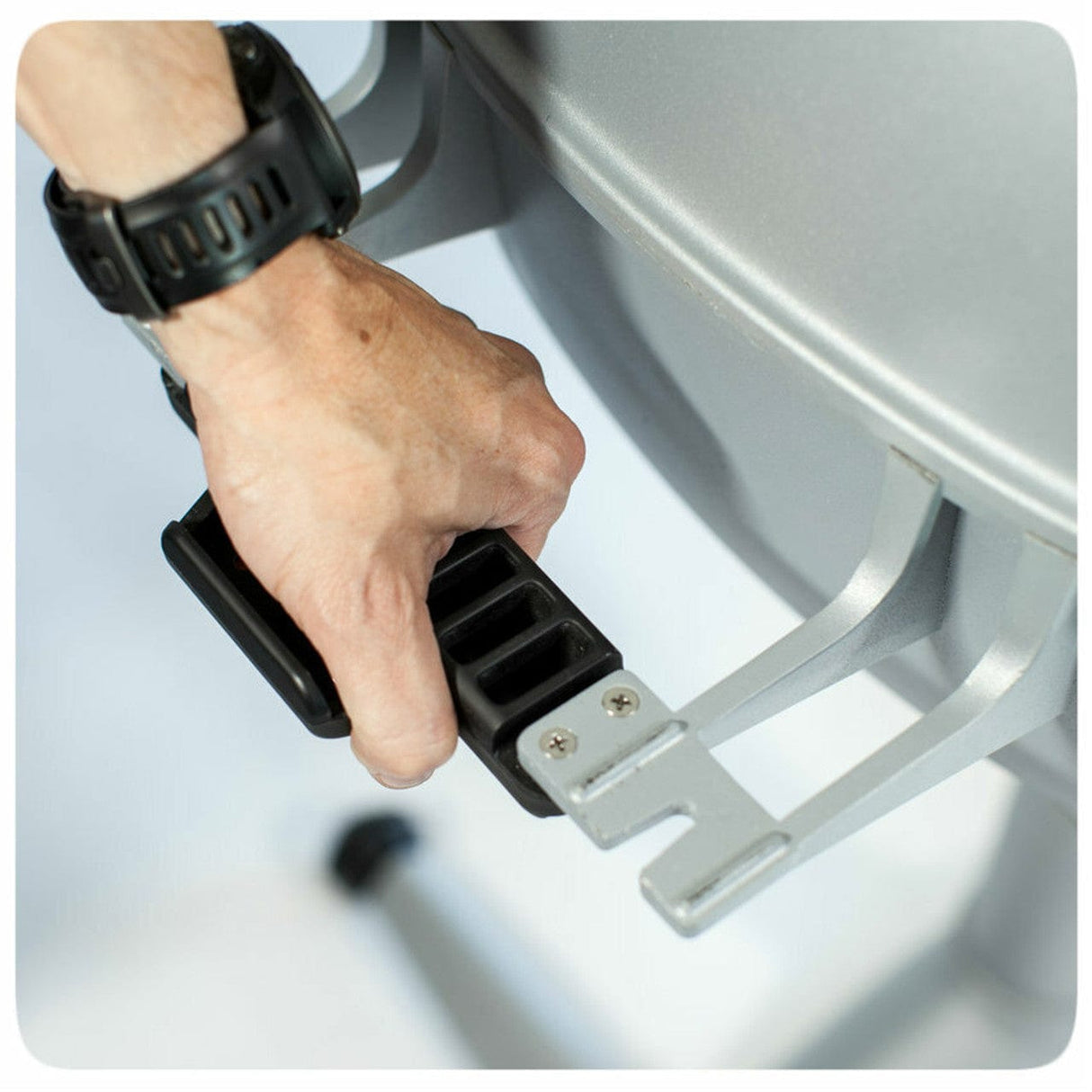 man holding PK360 Aluminium Charcoal Grill & Smoker handle