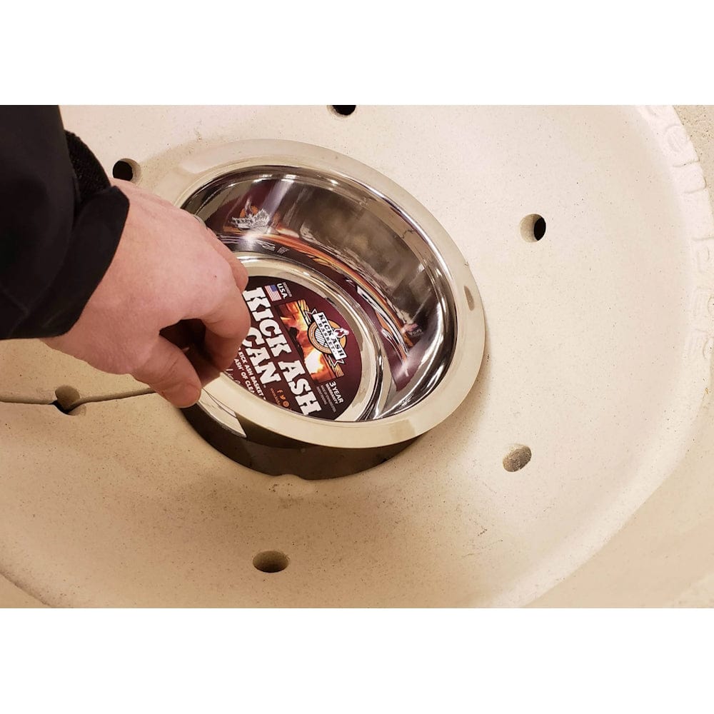 Large Kick Ash Can man placing can in grill