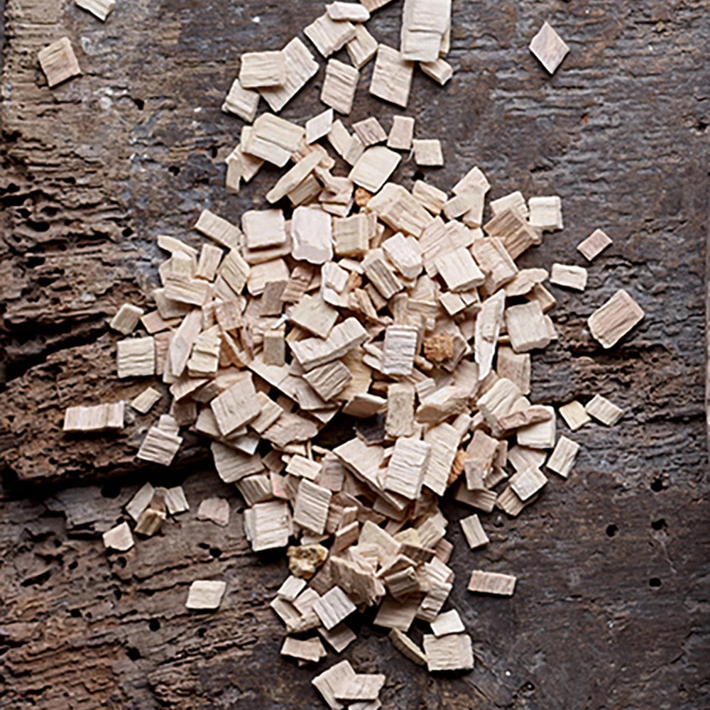 HotSmoked Beech Smoking Chips close up image of chips on rotten wooden board