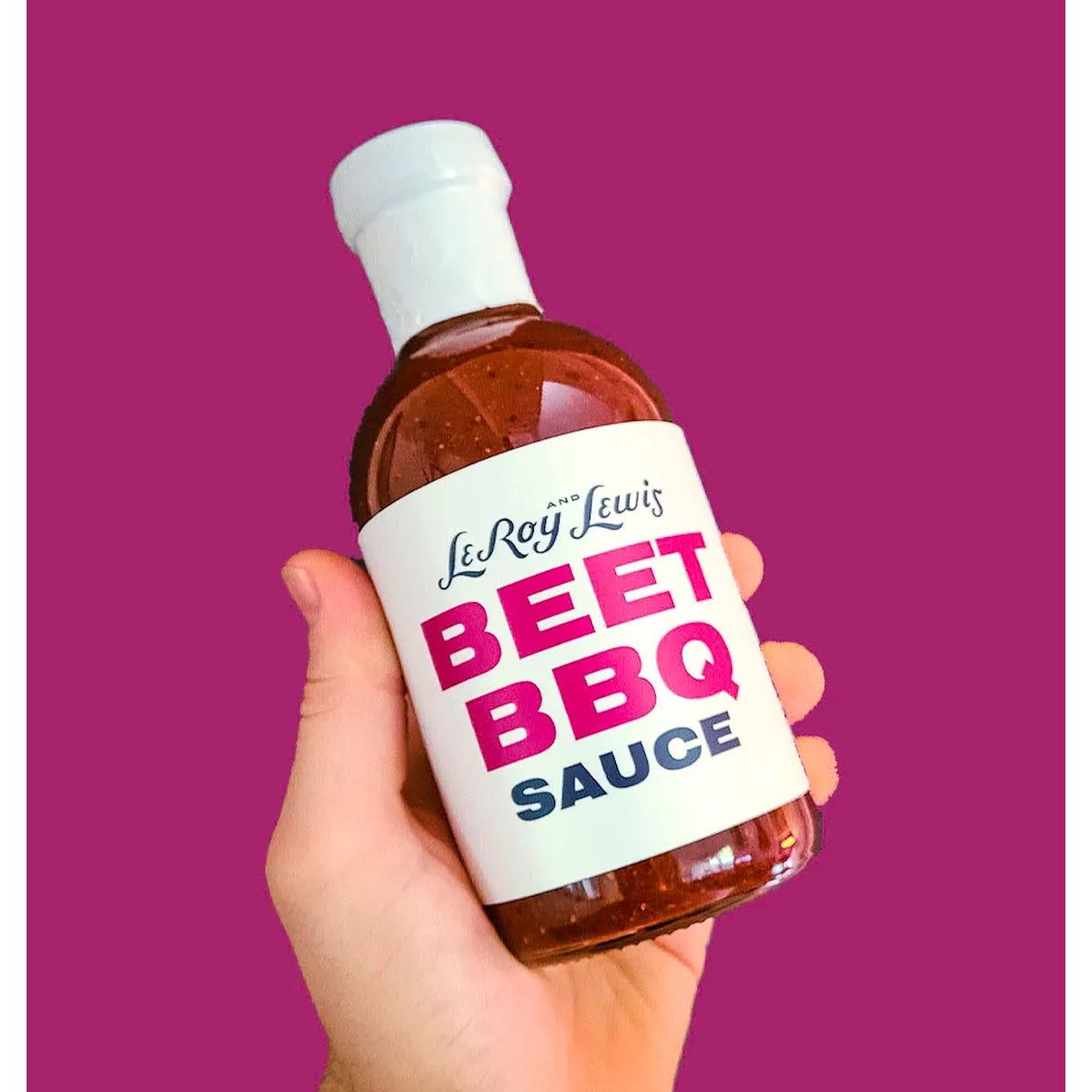 LeRoy & Lewis Beet BBQ Sauce hand holding product