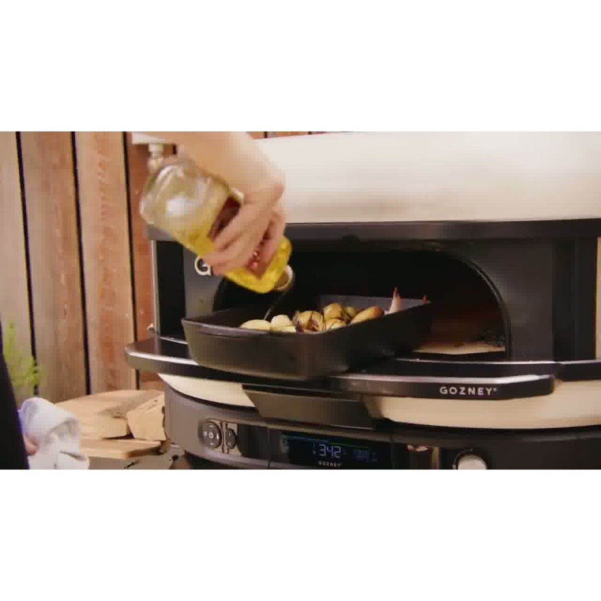 Dome Gen 2 Mantel man putting oil on food in trail