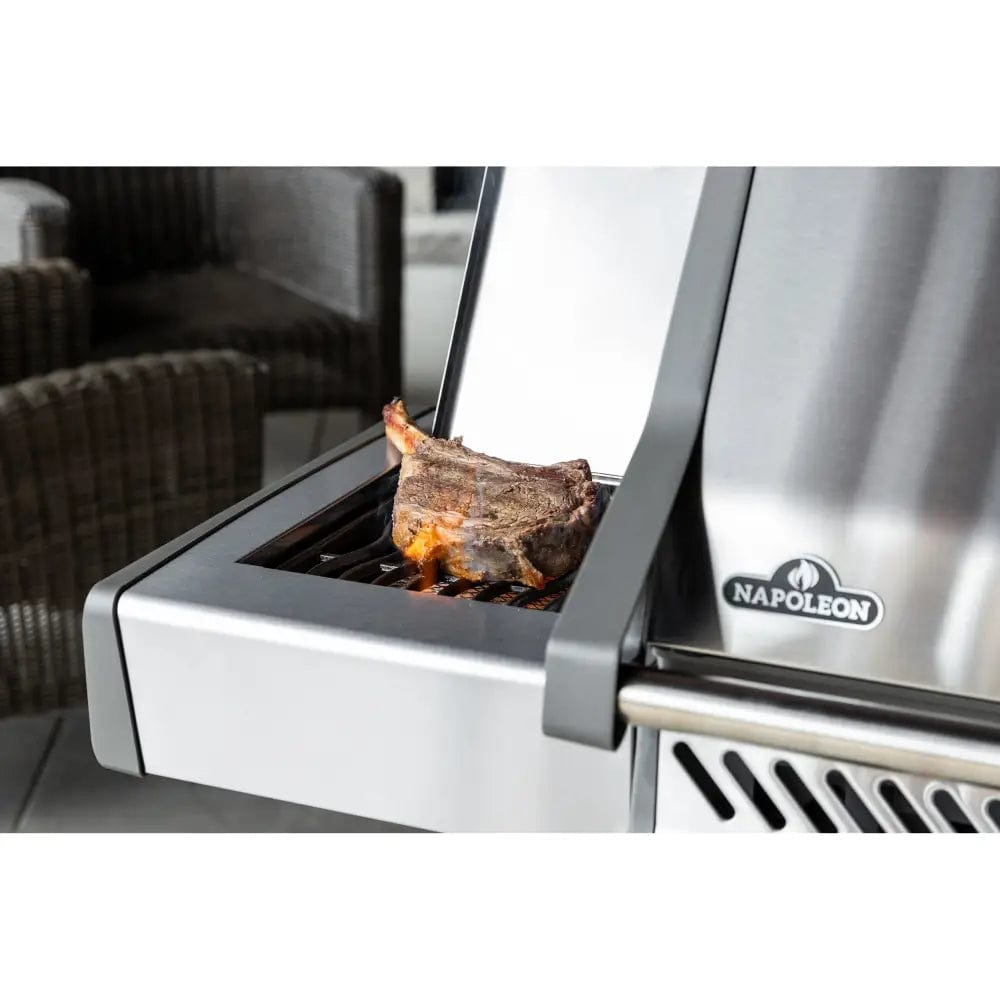Napoleon Rogue XT 525 SIB steak on a side burner