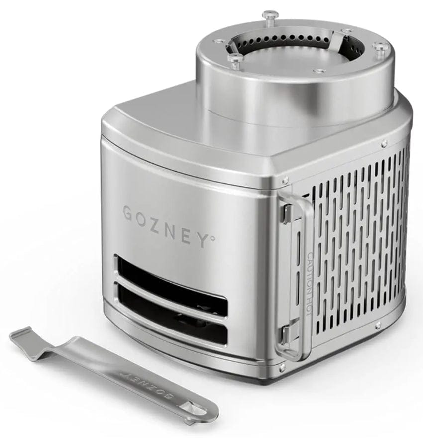 a Gozney Roccbox Pizza Wood Burner shown with fuel door closed and a wood tray holder