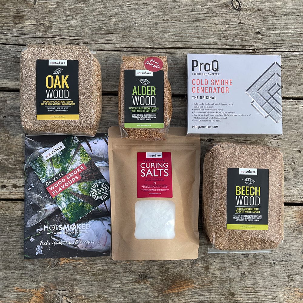 HotSmoked Cure & Smoke Kit all items on wooden table