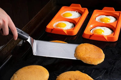 cooking buns and eggs on a griddle using Blackstone - 2 Section Egg Ring Tray 