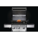Rotisserie Kit for Rogue Grills in use roasting pineapple