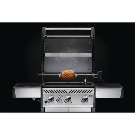 Rotisserie Kit for Rogue Grills in use roasting pineapple