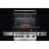 Rotisserie Kit for Rogue Grills in use roasting ribs