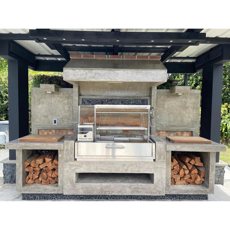 Argentine gaucho grill BBQ05SS unit installed in concrete with firewood ready