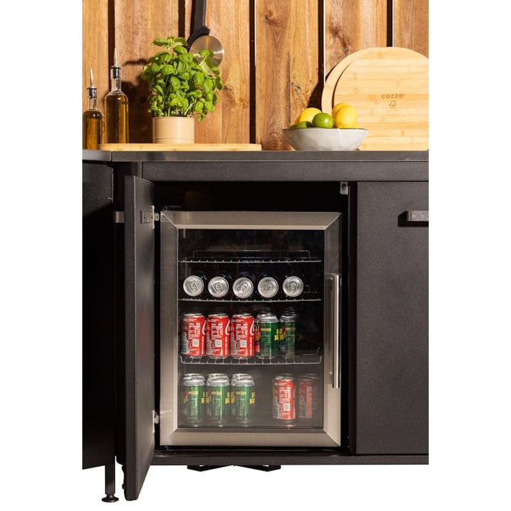 Cozze Outdoor Cooler full of drinks in outdoor kitchen unit