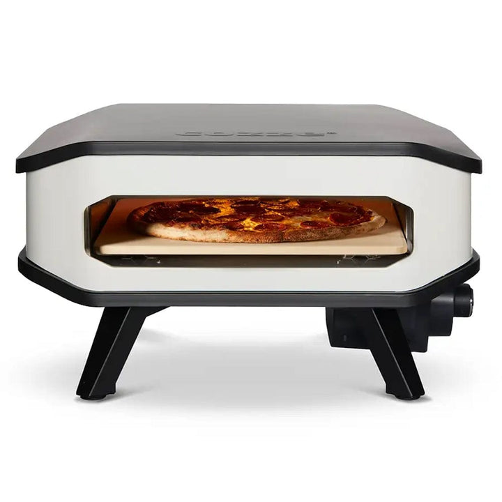 baking pizza on a pizza stone with Cozze Electric Pizza Oven 