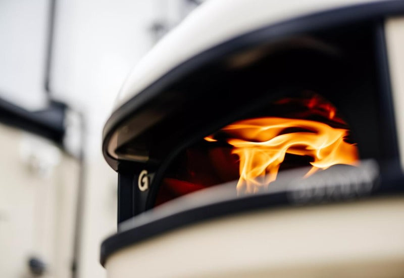lighting fire in Gozney Dome S1 outdoor oven