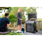 family grilling food on Napoleon Freestyle 425 SIB 