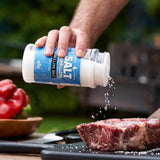 seasoning meat with Al Frugoni Grilling Salt