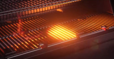a Masterbuilt Smoke + Sear Grates  on flame heated Gravity Series® 800 Grill