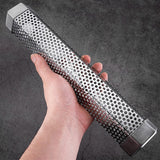 hand holding Stainless Steel Hexagonal Tube BBQ Smoker