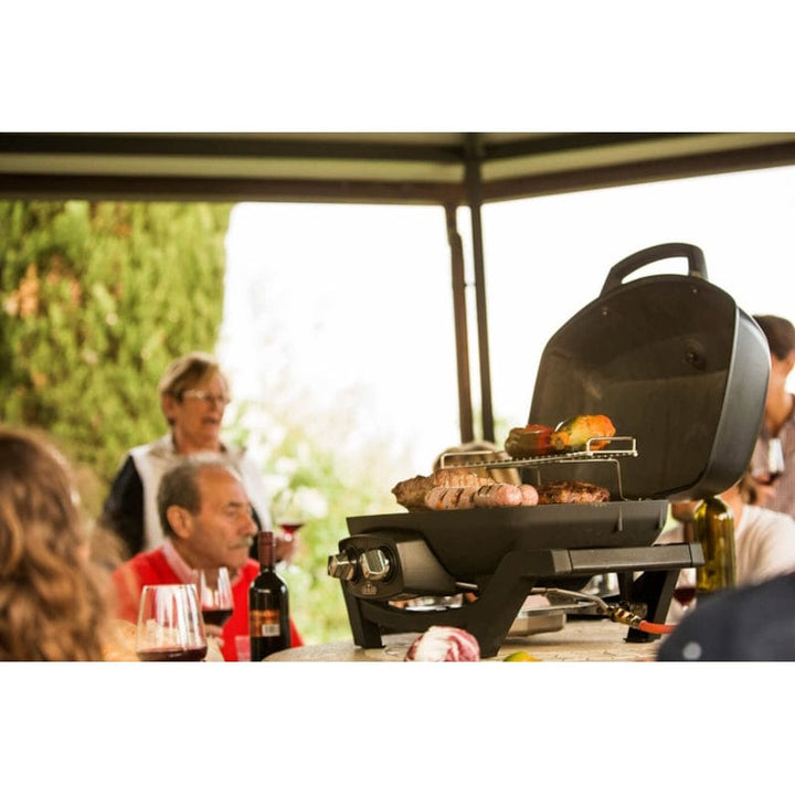 grilling food with Napoleon TravelQ Pro 285 Portable Gas Grill