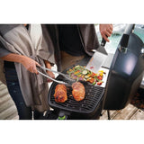 grilling food with Napoleon Electric Portable BBQ Grill