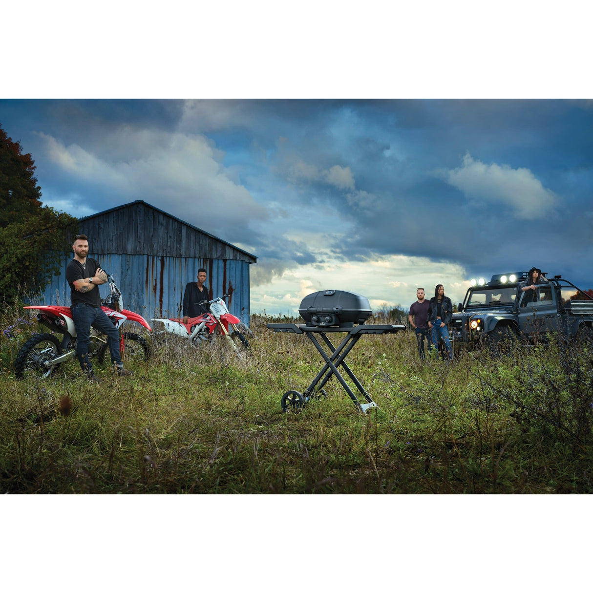 people standing next to motorcycles and a truck around Napoleon Phantom TravelQ portable