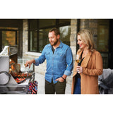 man and woman grilling on Napoleon Prestige PRO 500 RSIB