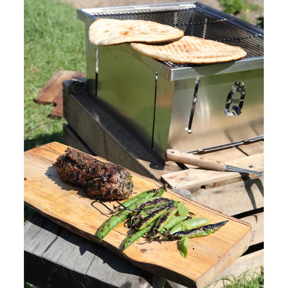 preparing food with Fold-Flat Portable Charcoal BBQ