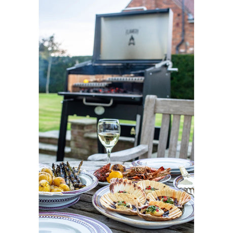 seafood prepared on a FLAMERY Small Asado Grill on Stand