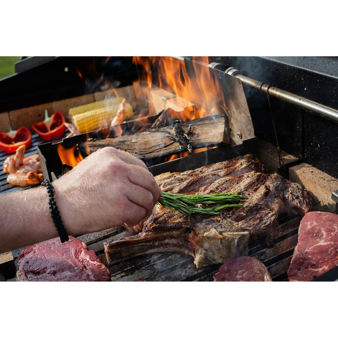 griling steak and vegetables on Large Asado Grill on Trolley