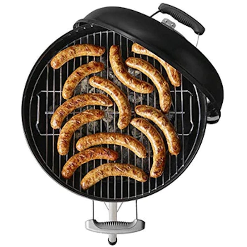 grilling sausages on a Bar-B-Kettle Charcoal Barbecue