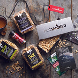 HotSmoked BBQ Hot Smoking Kit items from box scattered on table